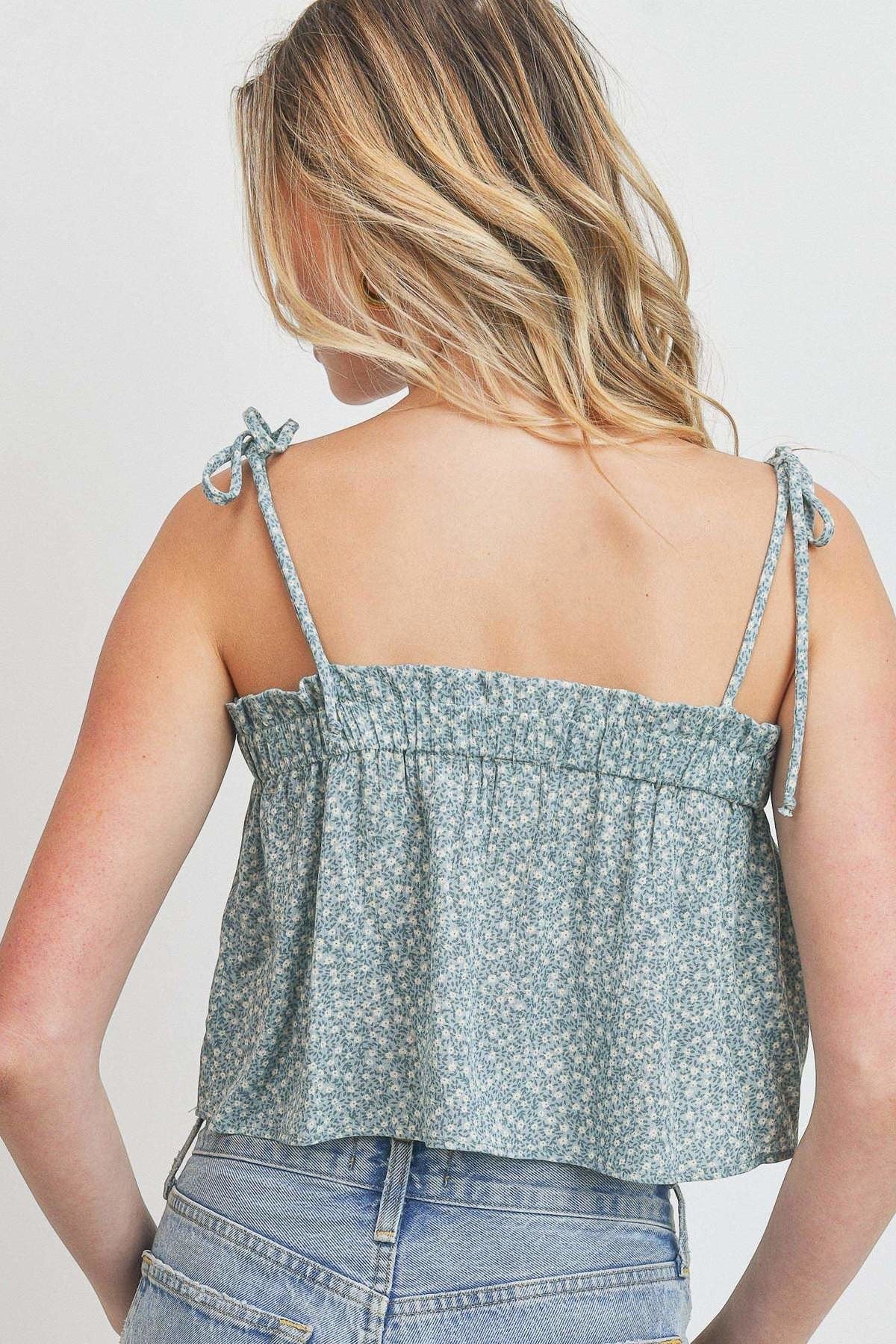 Top corto con tirantes y abertura elástica con estampado floral